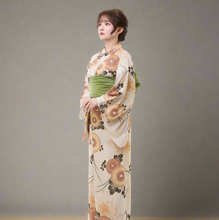 Woman wearing a floral kimono on a white background